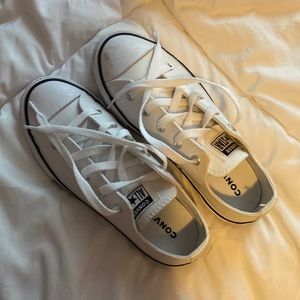 white with black stripe low top converse